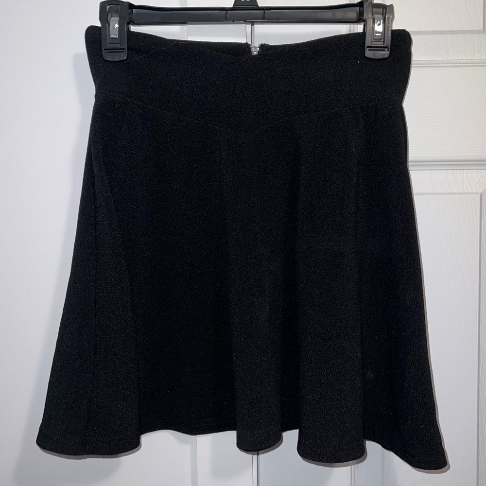 Black skirt, some texture, flows